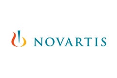 White tile with the word Novartis written in blue next to the company logo.