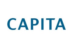 White tile with the word Capita written in blue.