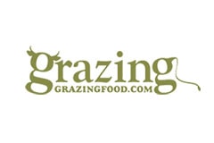 White tile with the words 'Grazing' and 'GrazingFood.com' written in green.