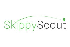 White tile with the words 'Skippy Scout' written in black and green.