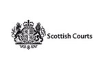 While tile with the words Scottish Courts written in black next to insignia.